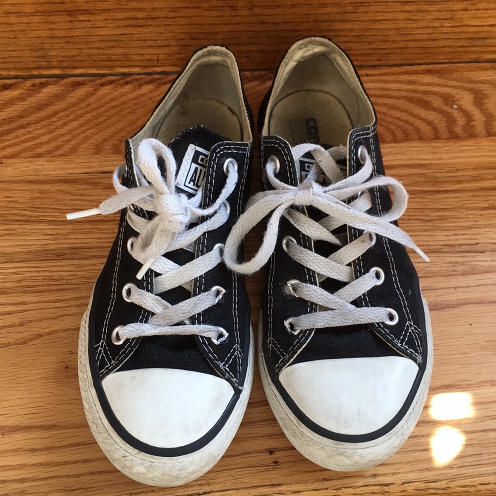 Youth Converse All Star sneakers.